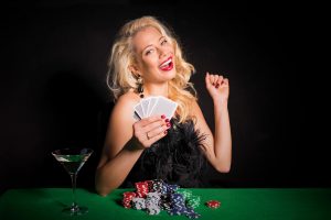 70203060 - lucky woman playing poker